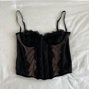 Urban Outfitters Corset 
Black lace corset w/ mesh details 
Adjustable straps